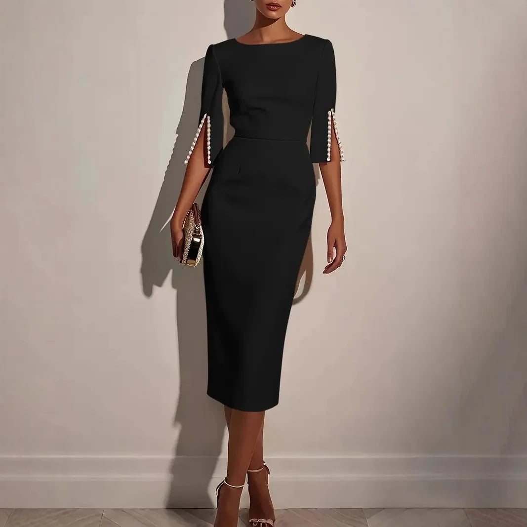 La Scintilla | VESTIDO ELEGANTE CON MANGAS ABIERTAS EMBELLECIDAS CON PERLAS