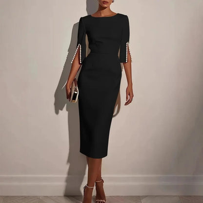 La Scintilla | VESTIDO ELEGANTE CON MANGAS ABIERTAS EMBELLECIDAS CON PERLAS