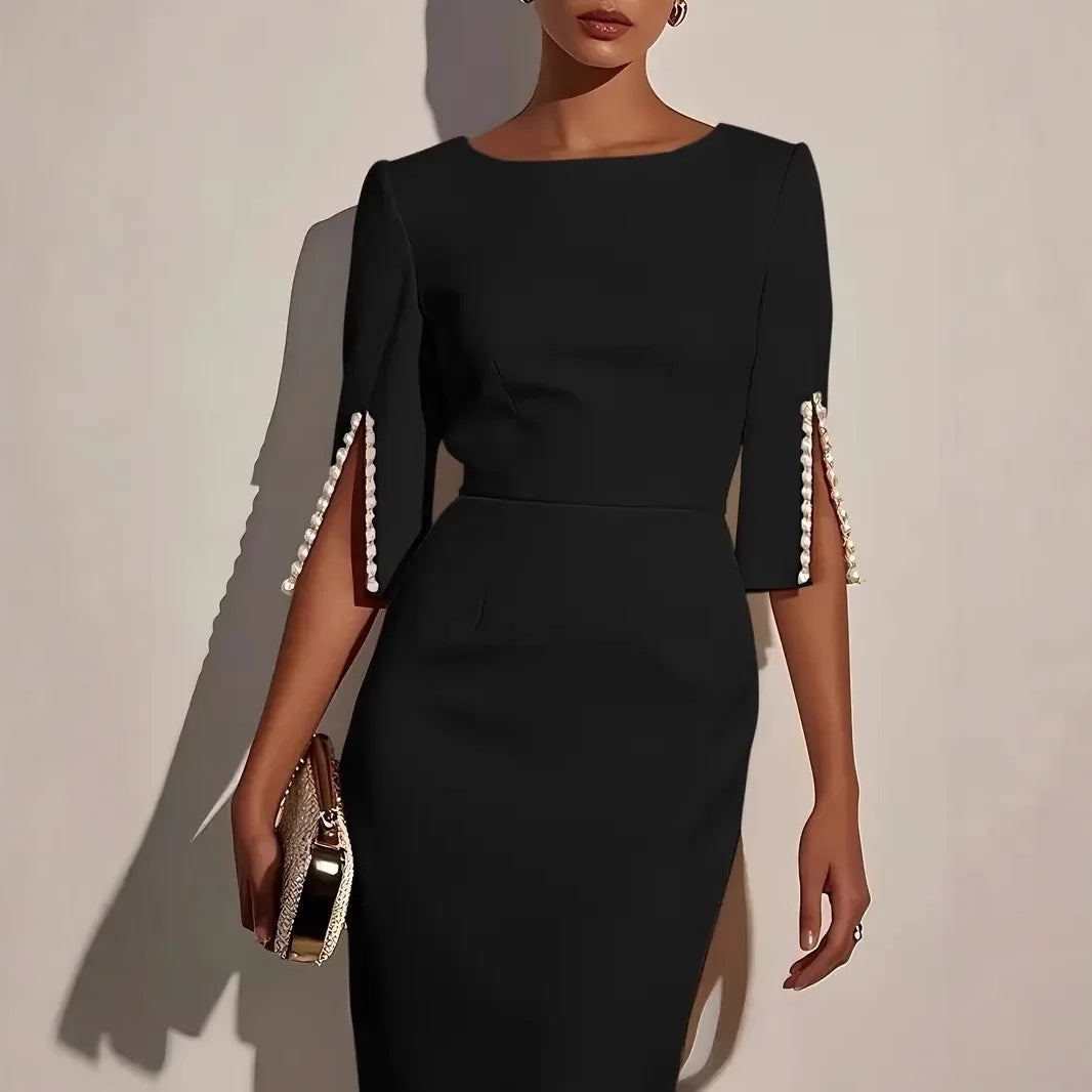 La Scintilla | VESTIDO ELEGANTE CON MANGAS ABIERTAS EMBELLECIDAS CON PERLAS